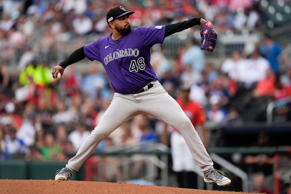 Colorado Rockies pitcher Germán Márquez (48) delivers against the Atlanta Braves in the first inning of a baseball game, Friday, June 13, 2025, in Atlanta. (AP Photo/Mike Stewart)