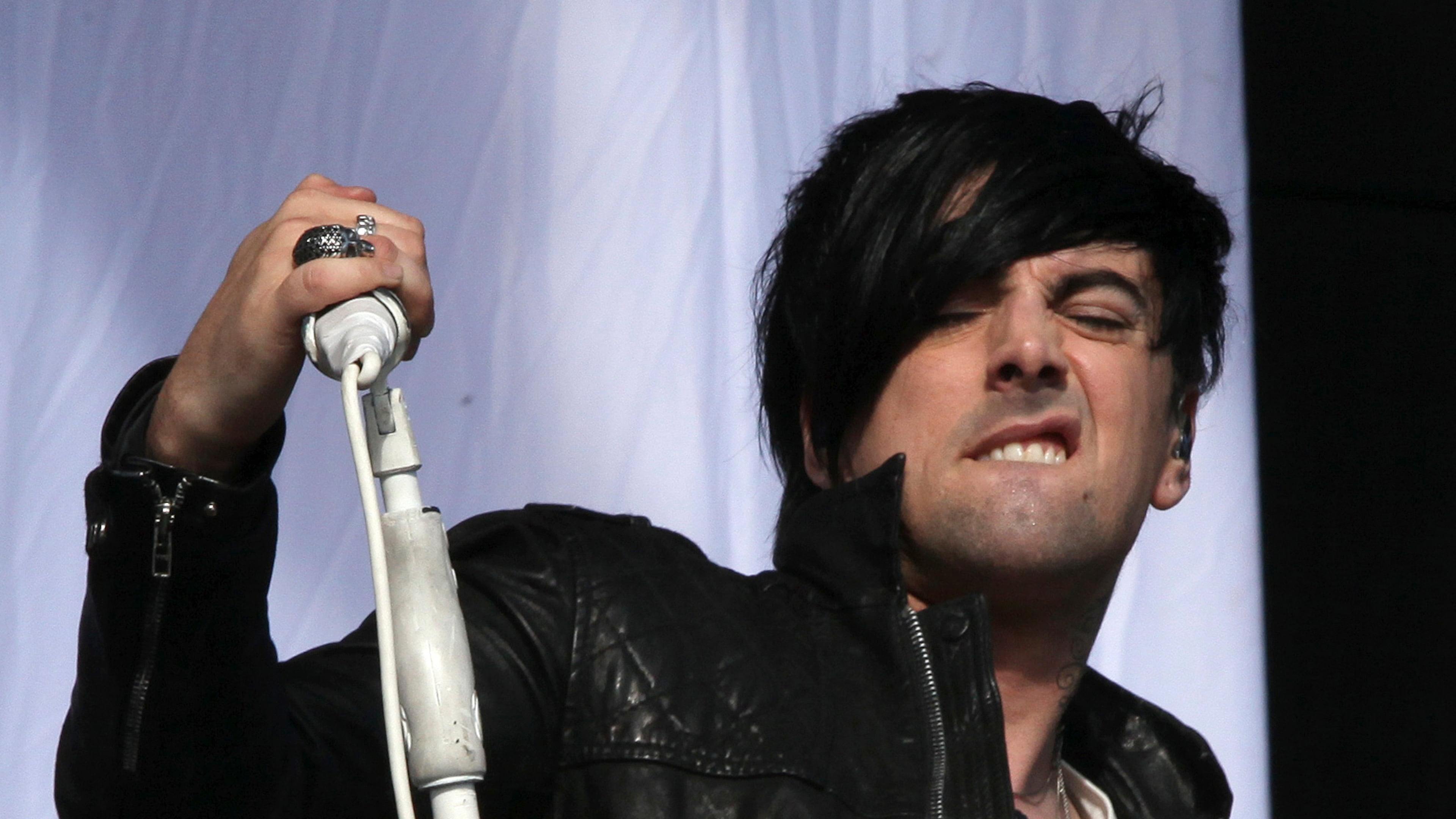 FILE - British musician Ian Watkins, lead singer of Lostprophets, as he performs on stage at V Music Festival in Hylands Park, Chelmsford, England on Aug 20, 2011. (AP Photo/Joel Ryan, File)