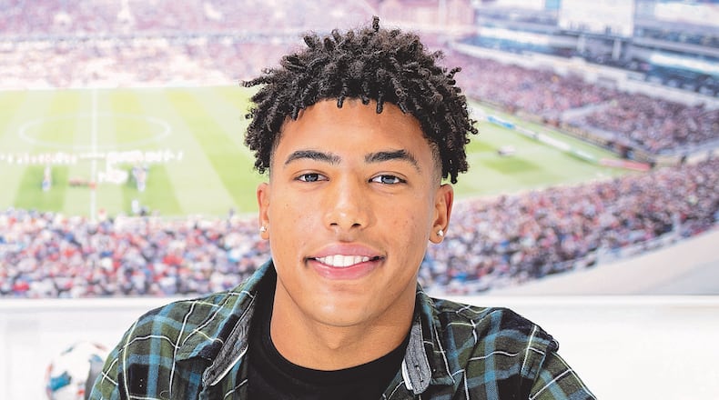 Atlanta United Homegrown signing Caleb Wiley sign his contract with his family at Children's Healthcare of Atlanta Training Ground in Marietta, Georgia, on Monday January 17, 2022. Photo by (Jacob Gonzalez/Atlanta United)