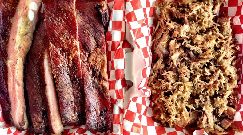 Pitmaster Bryan Furman smokes pork ribs and pasture-raised whole hogs at B's Cracklin' BBQ.