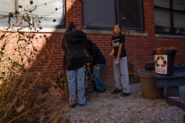 Addelynn Covingtree (right), Yadajah Gresham and Elissa Ramirez participate in the Compost Connectors program at Marietta Middle School on Monday, Nov. 17, 2025. (Olivia Bowdoin for the AJC)