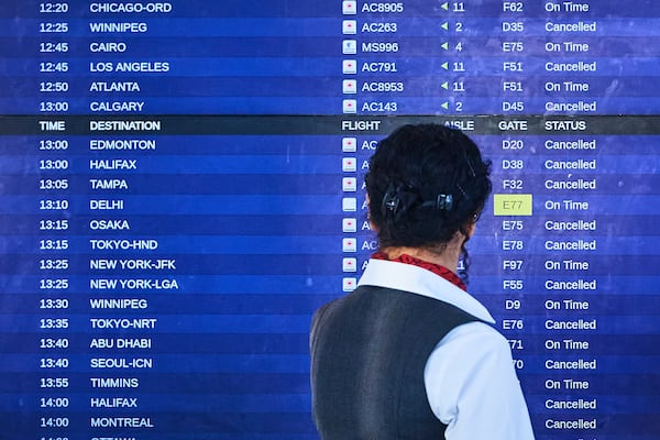 Air Canada flights show as cancelled at Pearson International Airport as flight attendants go on strike in Toronto on Saturday, Aug. 16, 2025. (Sammy Kogan/The Canadian Press via AP)