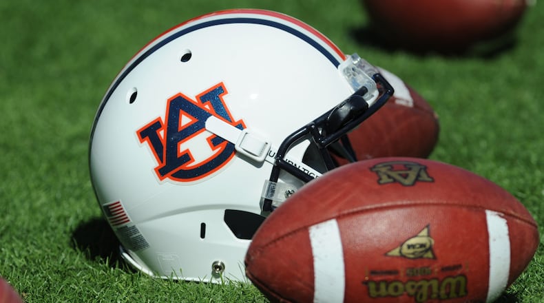A helmet and footballs of the Auburn Tigers are on the field before play against the Chattanooga Mocs November 6, 2010 at Jordan-Hare Stadium in Auburn, Alabama. (Photo by Al Messerschmidt/Getty Images)
