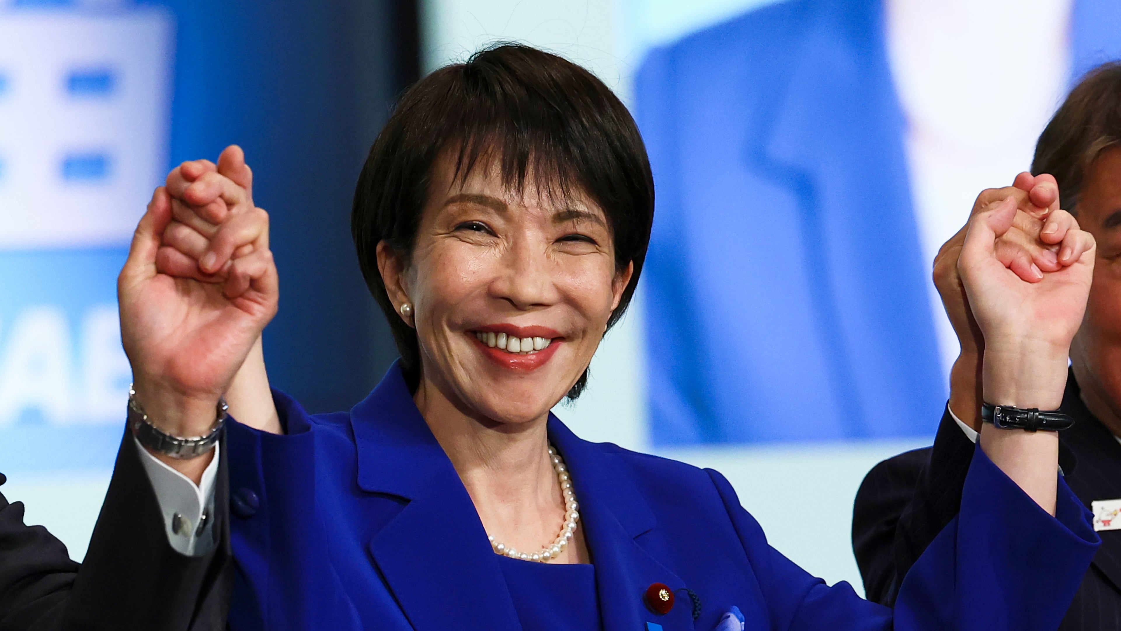 Newly-elected leader of Japan's Liberal Democratic Party (LDP) Sanae Takaichi celebrates after winning the LDP leadership election in Tokyo, Japan, Saturday, Oct. 4, 2025. (Kim Kyung-Hoon/Pool Photo via AP)