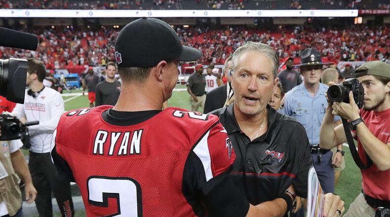 September 11, 2016 ATLANTA: Falcons quarterback Matt Ryan congratulates Buccaneers head coach Dirk Koetter after his former coach beat the Falcons 31-24 in an NFL football game on Sunday, Sept. 11, 2016, in Atlanta. Curtis Compton /ccompton@ajc.com