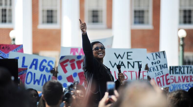 In this file photo, Sunny Fowler speaks during a rally by Ole Miss students calling on the university to remove the Mississippi state flag from university grounds, in Oxford, Miss. Bruce Newman/The Oxford Eagle via AP