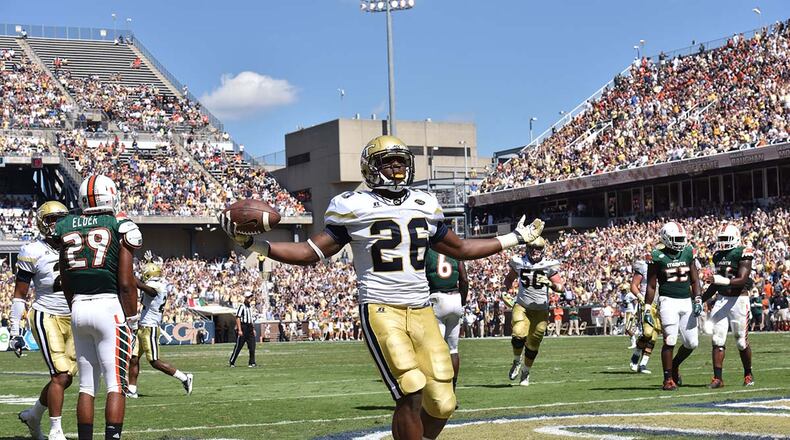 October 1, 2016 Atlanta - Georgia Tech Yellow Jackets running back Dedrick Mills (26) celebrates after he scored a touch in the first half at Bobby Dodd Stadium on Saturday, October 1, 2016. HYOSUB SHIN / HSHIN@AJC.COM