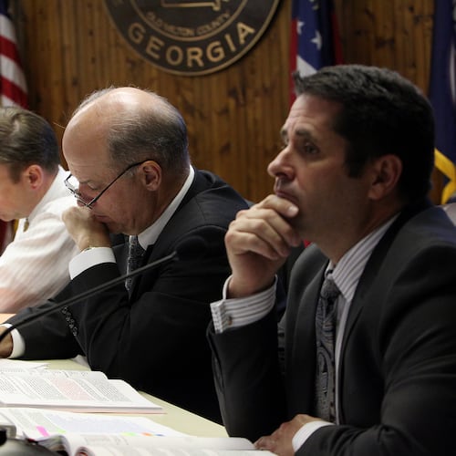 Mayor David Belle Isle (from left) and council members Chris Owens, Mike Kennedy and Donald F. Mitchell consider a request to develop an approximately 86 acre site on Old Milton Parkway and Georgia 400 named Avalon during a City of Alpharetta public hearing. (Curtis Compton/AJC 2012)