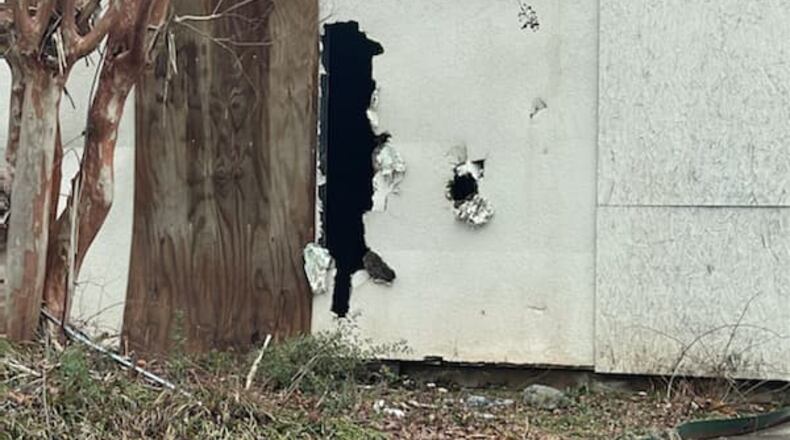 The Sprayberry Crossing shopping center has been an eyesore for residents. Cobb County's planning commission on Tuesday discussed the possibility of a developer revamping the shopping center and building apartments and space for a grocery store. Credit: Joe Glancy