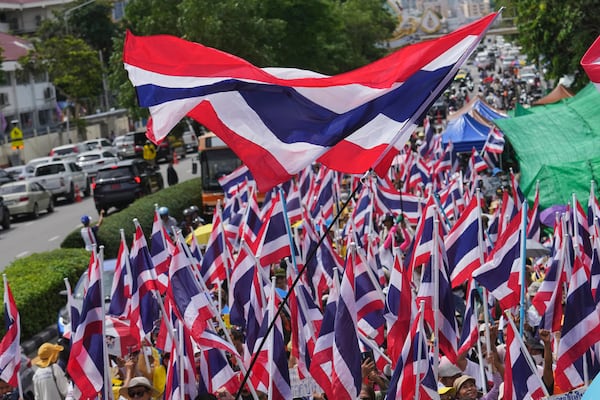 Anti-government protesters gather in front of Government house demanding Thailand's Prime Minister Paetongtarn Shinawatra resign in Bangkok, Thailand, Thursday, June 19, 2025, (AP Photo/Sakchai Lalit)