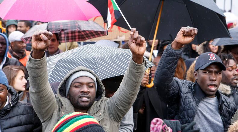 People protest against slavery and slave auctions in Libya, during a rally in Geneva, Switzerland, Nov. 25, 2017.