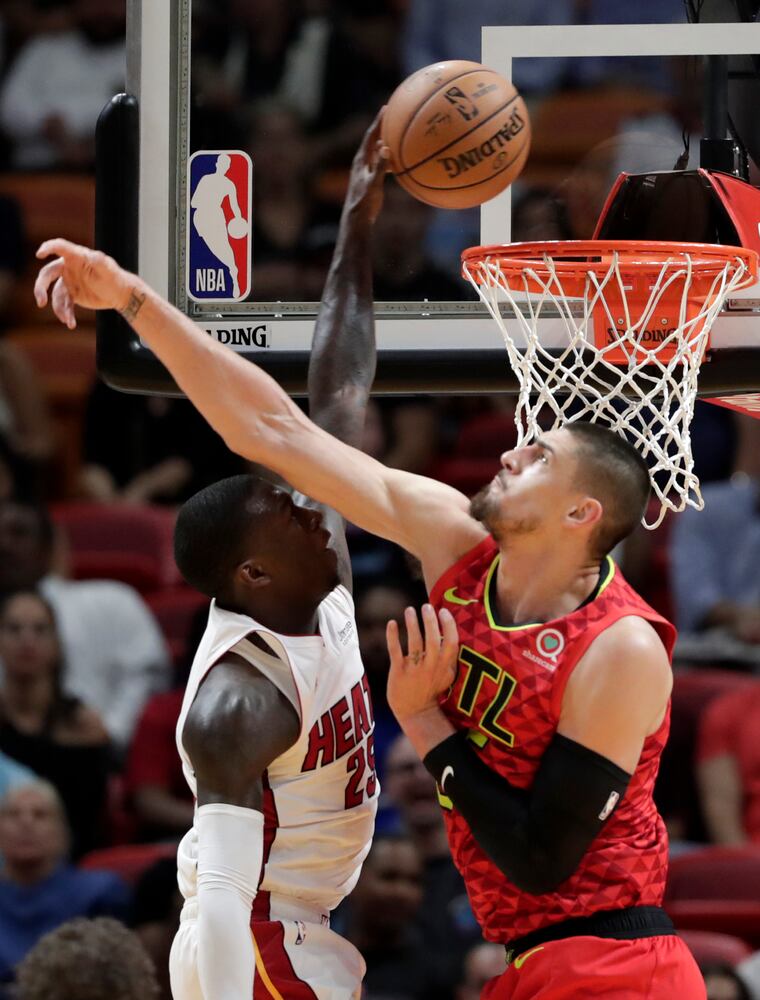 Photos: Hawks star Trae Young injures ankle