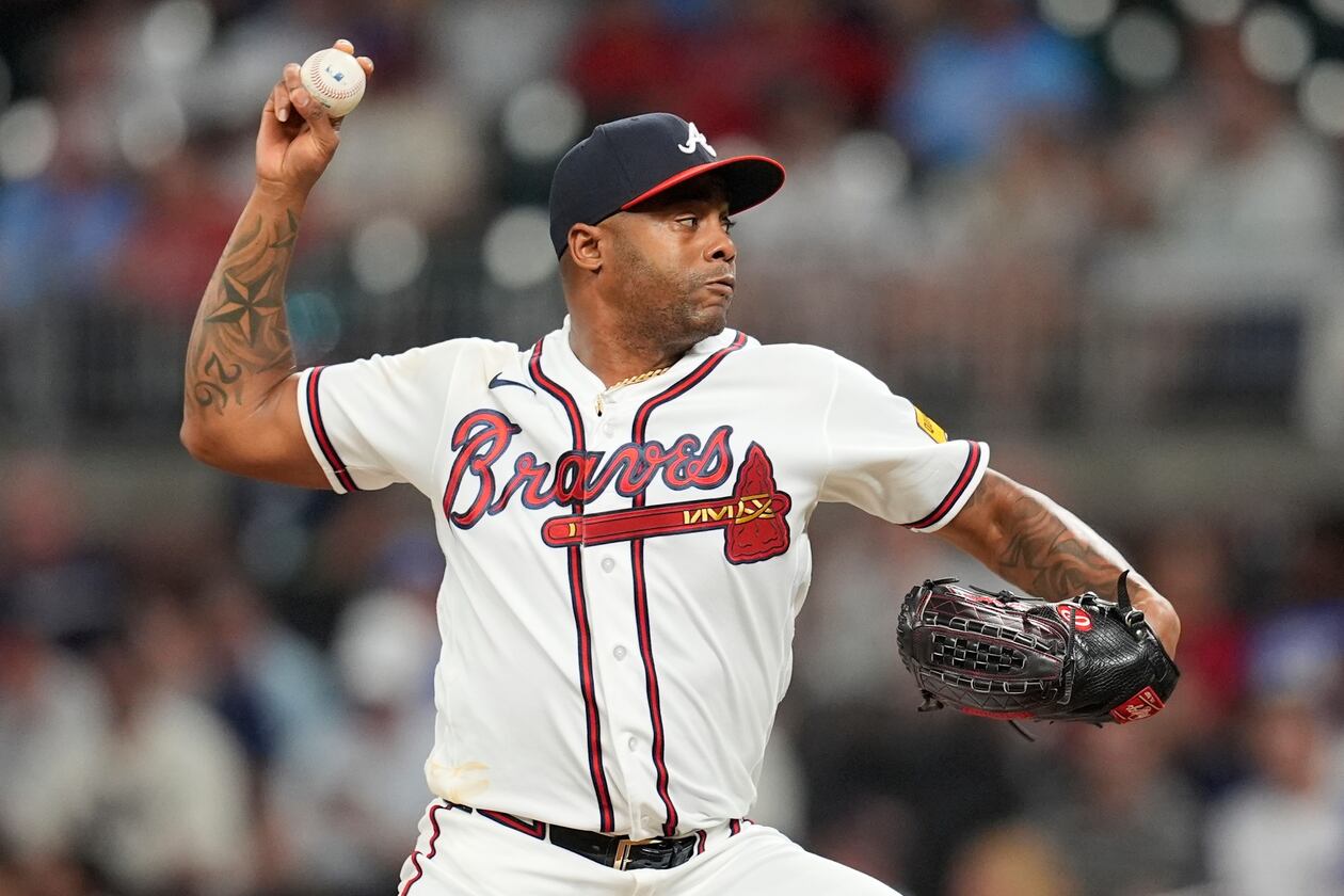 Atlanta Braves pitcher Raisel Iglesias (26) works in the nineth inning of a baseball game against the Miami Marlins, Tuesday, Aug. 4, 2026, in Atlanta. (AP Photo/Mike Stewart)