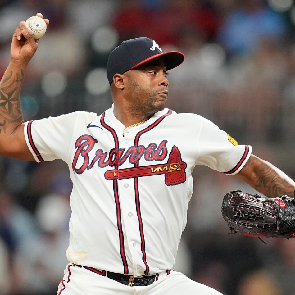 Atlanta Braves pitcher Raisel Iglesias (26) works in the nineth inning of a baseball game against the Miami Marlins, Tuesday, Aug. 4, 2026, in Atlanta. (AP Photo/Mike Stewart)