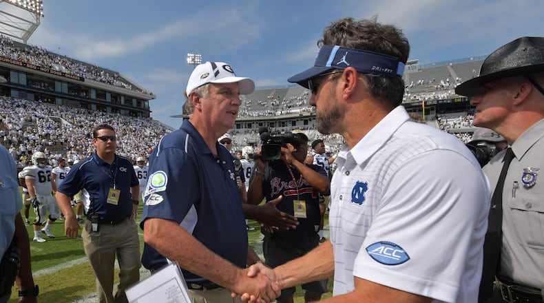 September 30, 2017 Atlanta -Georgia Tech head coach Paul Johnson and North Carolina head coach Larry Fedora shake hand after their NCAA college football game at Bobby Dodd Stadium on Saturday, September 30, 2017. Georgia Tech won 33 - 7 over the North Carolina. HYOSUB SHIN / HSHIN@AJC.COM