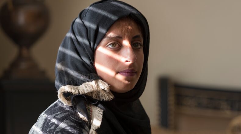 November 9, 2016, Suwanee - Anwar Barash, an 18-year-old Palestinian, poses for a portrait in Suwanee, Georgia, on Wednesday, November 9, 2016. Barash is being treated for burns she received when she was 3 years old through efforts by the Palestine Childrenâs Relief Fund. (DAVID BARNES / DAVID.BARNES@AJC.COM)