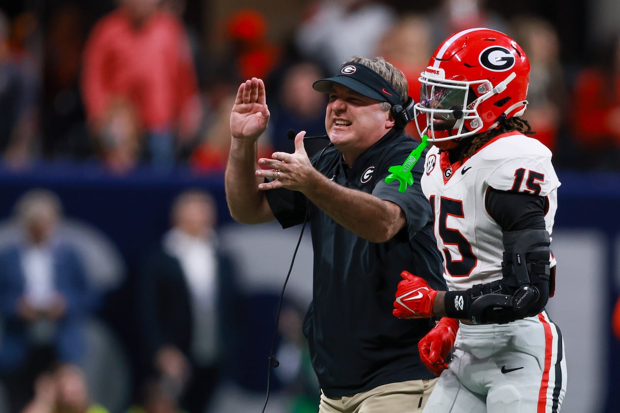 Georgia head coach Kirby Smart reacts after a penalty against defensive back Demello Jones (right) during the fourth quarter of the SEC Championship game against Alabama at Mercedes-Benz Stadium, Saturday, Dec. 6, 2025, in Atlanta. (Jason Getz/AJC)
