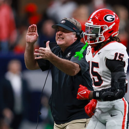 Georgia head coach Kirby Smart reacts after a penalty against defensive back Demello Jones (right) during the fourth quarter of the SEC Championship game against Alabama at Mercedes-Benz Stadium, Saturday, Dec. 6, 2025, in Atlanta. (Jason Getz/AJC)