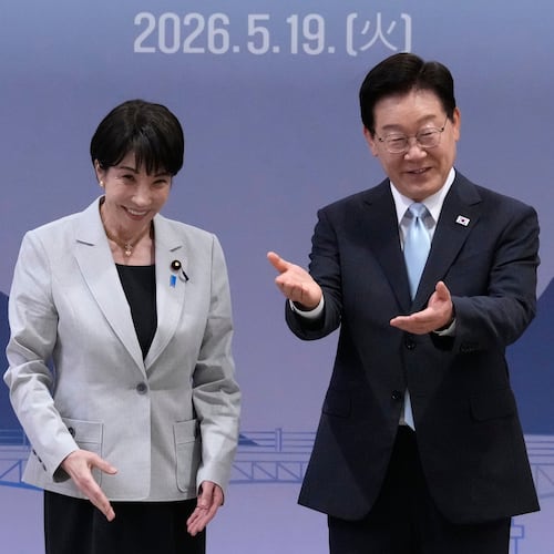 Japan's Prime Minister Sanae Takaichi, left, and South Kore's President Lee Jae Myung react during their meeting in Andong, South Korea, Tuesday, May 19, 2026. (AP Photo/Ahn Young-joon, Pool)