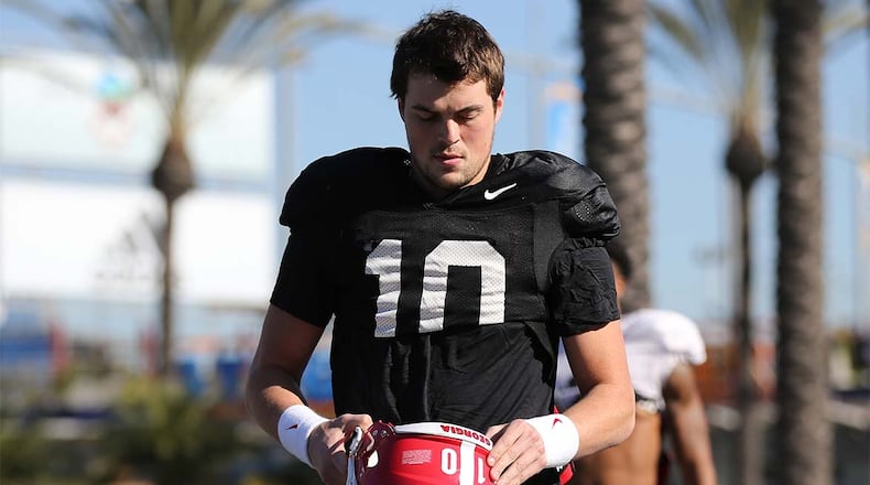 Jacob Eason walks to Georgia team practice for the Rose Bowl.