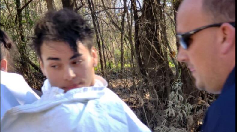 Jay Juarez was honored for saving a woman who jumped into the frigid, swollen Flint River on Monday. Image Albany Police