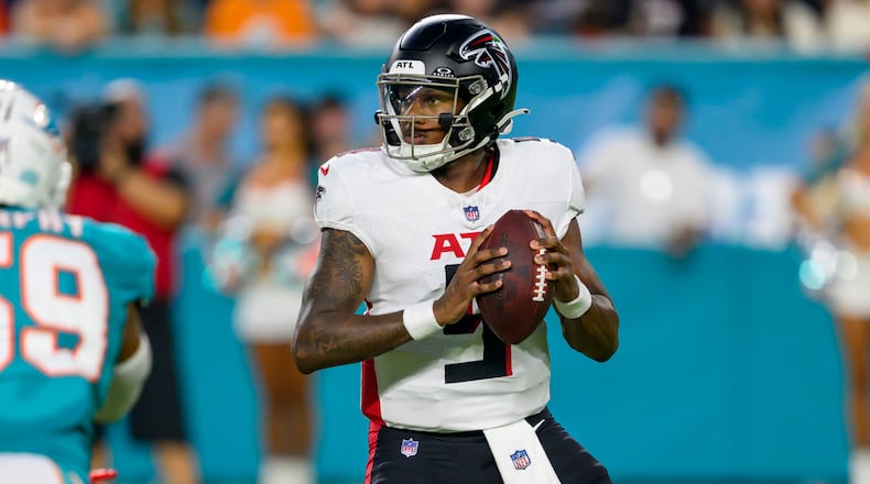 Atlanta Falcons quarterback Michael Penix Jr. (9) looks to throw the ball during an NFL pre-season football game against the Miami Dolphins, Friday, Aug. 9, 2024, in Miami Gardens, Fla. (AP Photo/Doug Murray)