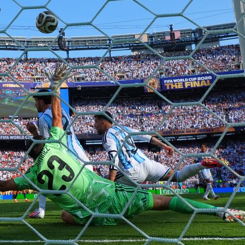 Spain's Ferran Torres (7) scores their first goal past Argentina goalkeeper Emiliano Martinez (23) during the World Cup final soccer match between Spain and Argentina in East Rutherford, N.J., near New York, Sunday, July 19, 2026. (AP Photo/Matt Slocum)