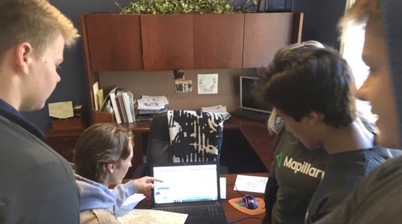 Eagle Scout Karson Greenburg and his team work to “Complete the Map,” a project to photograph every public and private street in Johns Creek. CITY OF JOHNS CREEK