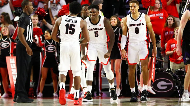 Anthony Edwards (5) celebrates with Georgia teammates against Western Carolina Tuesday, Nov. 5, 2019, at Stegeman Coliseum in Athens.