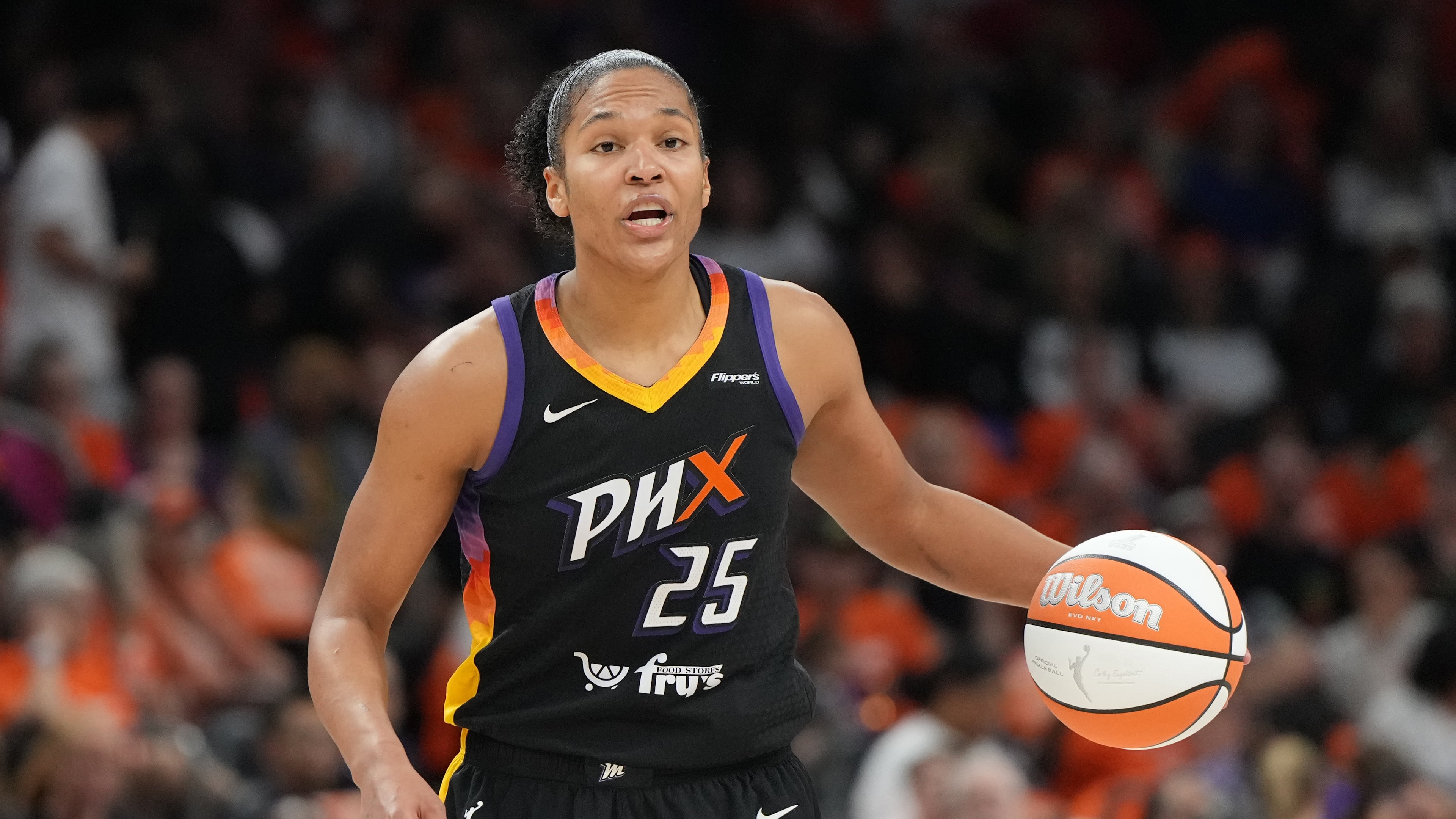 FILE - Phoenix Mercury forward Alyssa Thomas (25) drives against the Las Vegas Aces during the first half of Game 3 of the WNBA basketball finals, Wednesday, Oct. 8, 2025, in Phoenix. (AP Photo/Rick Scuteri, File)