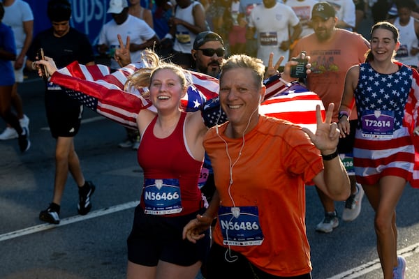 Set out all your race-day gear the night before, including anything red, white, and blue, so you're not fumbling at 4 a.m. (Arvin Temkar/AJC)