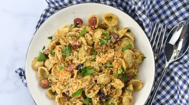 Pesto Pasta with Sausage and Olives. (CHRIS HUNT FOR THE ATLANTA JOURNAL-CONSTITUTION)