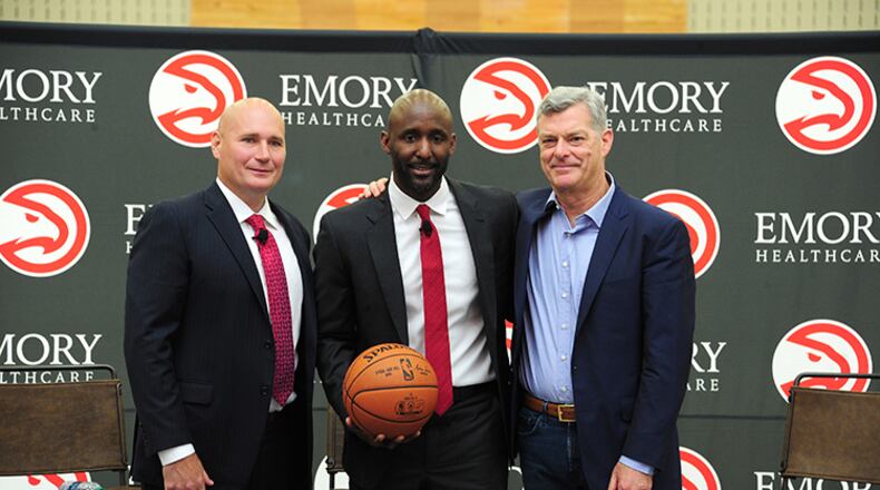 Travis Schlenk, Lloyd Pierce and Tony Ressler.
