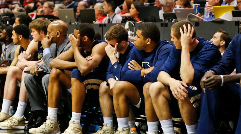 The Georgia Tech bench is sullen as San Diego State expands its lead during the second half in an NCAA college basketball game in the men's NIT on Wednesday, March 23, 2016, in San Diego. (AP Photo/Lenny Ignelzi)