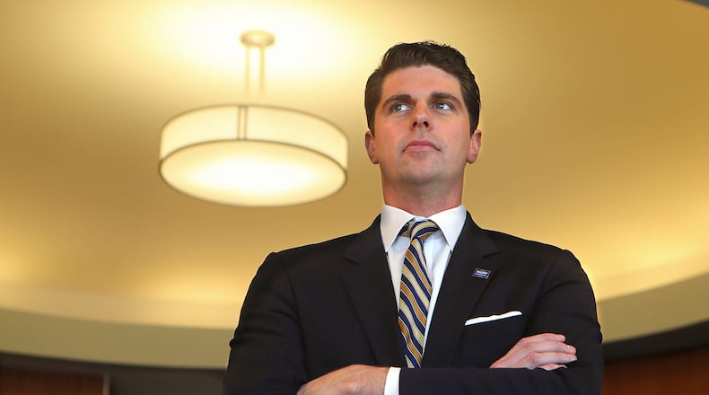March 15, 2017, Cumming: Seth Weathers, the political consultant who represents embattled Gwinnett County Commissioner Tommy Hunter, poses for a portrait at his WEATHERSCORP business office on Wednesday, March 15, 2017, in Cumming. Curtis Compton/ccompton@ajc.com