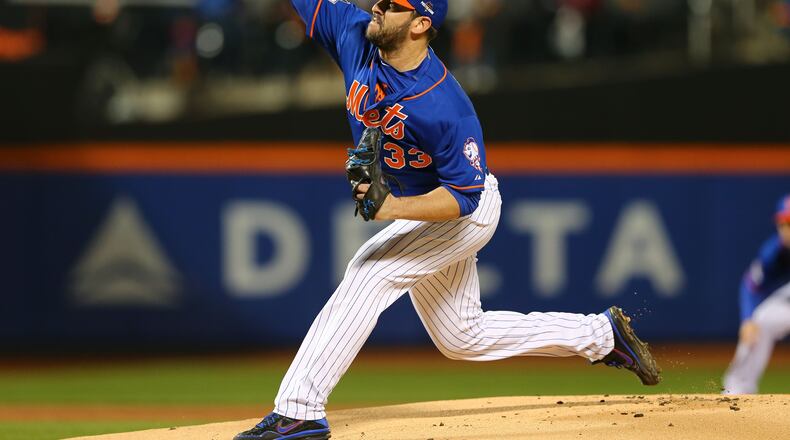 New York Mets pitcher Matt Harvey throws during the first inning of Game 1 of the National League baseball championship series against the Chicago Cubs Saturday, Oct. 17, 2015, in New York. (AP Photo/Elsa Garrison, Pool)