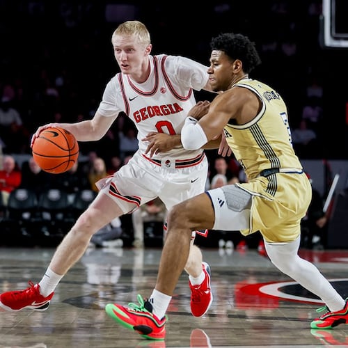 Georgia’s Blue Cain (left) is defended by Tech’s Jaeden Mustaf in the teams’ game at Stegeman Coliseum on Friday, Nov. 14, 2025, in Athens. (Courtesy of Georgia Basketball/X)