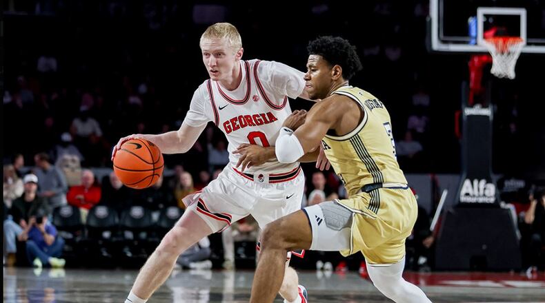Georgia’s Blue Cain (left) is defended by Tech’s Jaeden Mustaf in the teams’ game at Stegeman Coliseum on Friday, Nov. 14, 2025, in Athens. (Courtesy of Georgia Basketball/X)