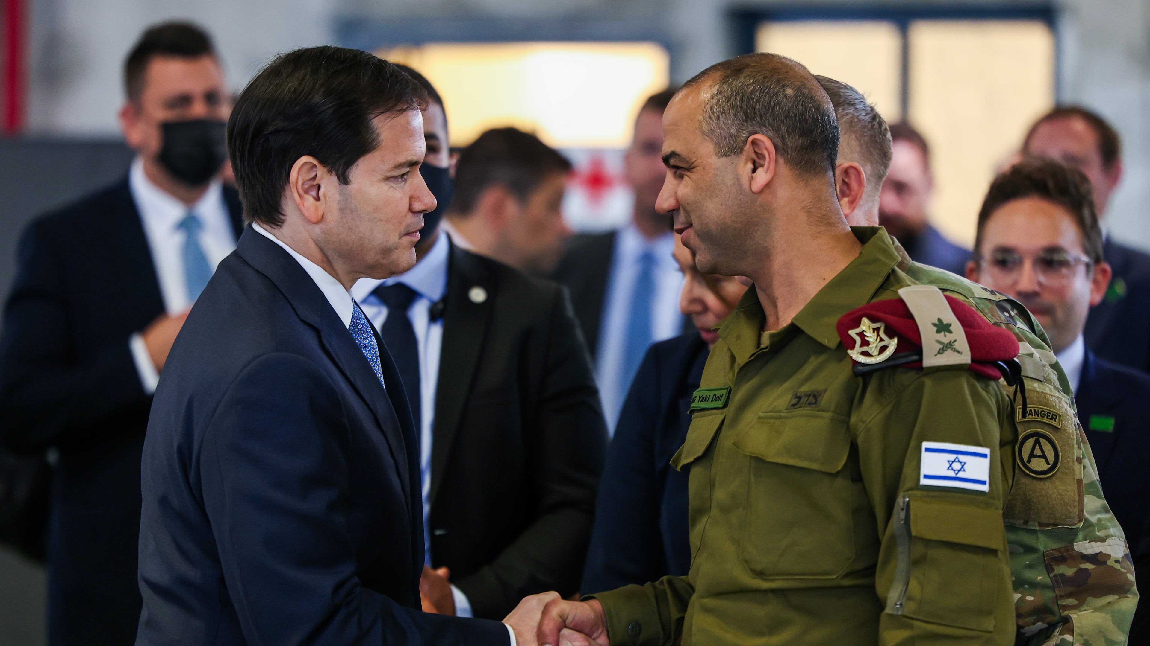 US Secretary of State Marco Rubio speaks with Israeli Brigadier General Yaakov Dolf as he visits the Civil-Military Coordination Center in Southern Israel, Friday, Oct. 24, 2025. (Fadel Senna/Pool Photo via AP)
