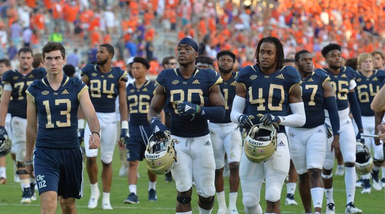 Georgia Tech players leave after they lost to the Clemson at Bobby Dodd Stadium on Saturday, September 22, 2018.  HYOSUB SHIN / HSHIN@AJC.COM