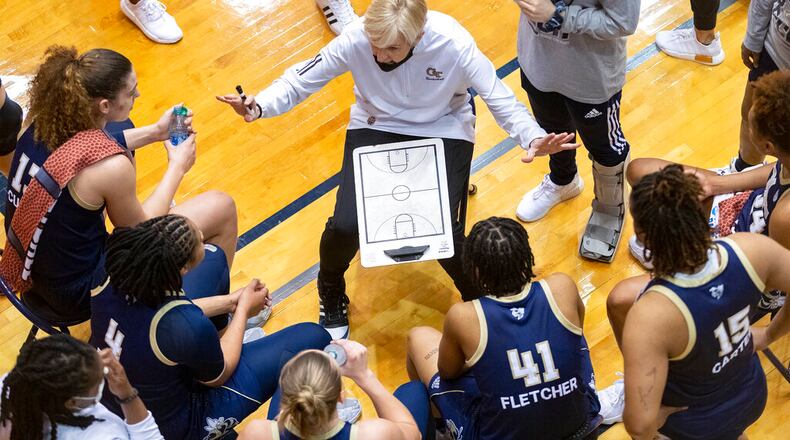 Georgia Tech coach Nell Fortner talks with players during a timeout in the second half of the team's college basketball game against West Virginia in the second round of the NCAA women's tournament at the UTSA Convocation Center in San Antonio on Tuesday, March 23, 2021. (AP Photo/Stephen Spillman)