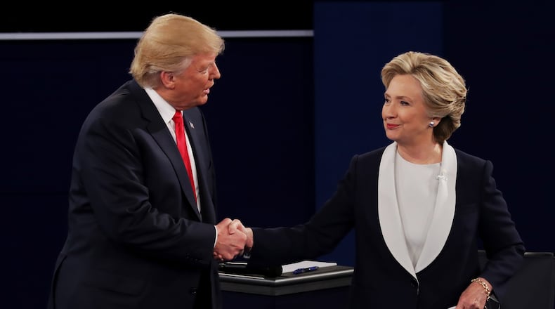 Donald Trump shakes hands with Hillary Clinton during the second presidential debate earlier this month. Chip Somodevilla/Getty Images