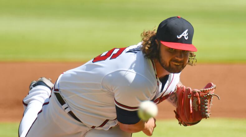 May 22, 2021 Atlanta - Atlanta Braves starting pitcher Bryse Wilson throws a pitch in the first inning against Pittsburgh Pirates at Truist Park on Saturday, May 22, 2021. (Hyosub Shin / Hyosub.Shin@ajc.com)