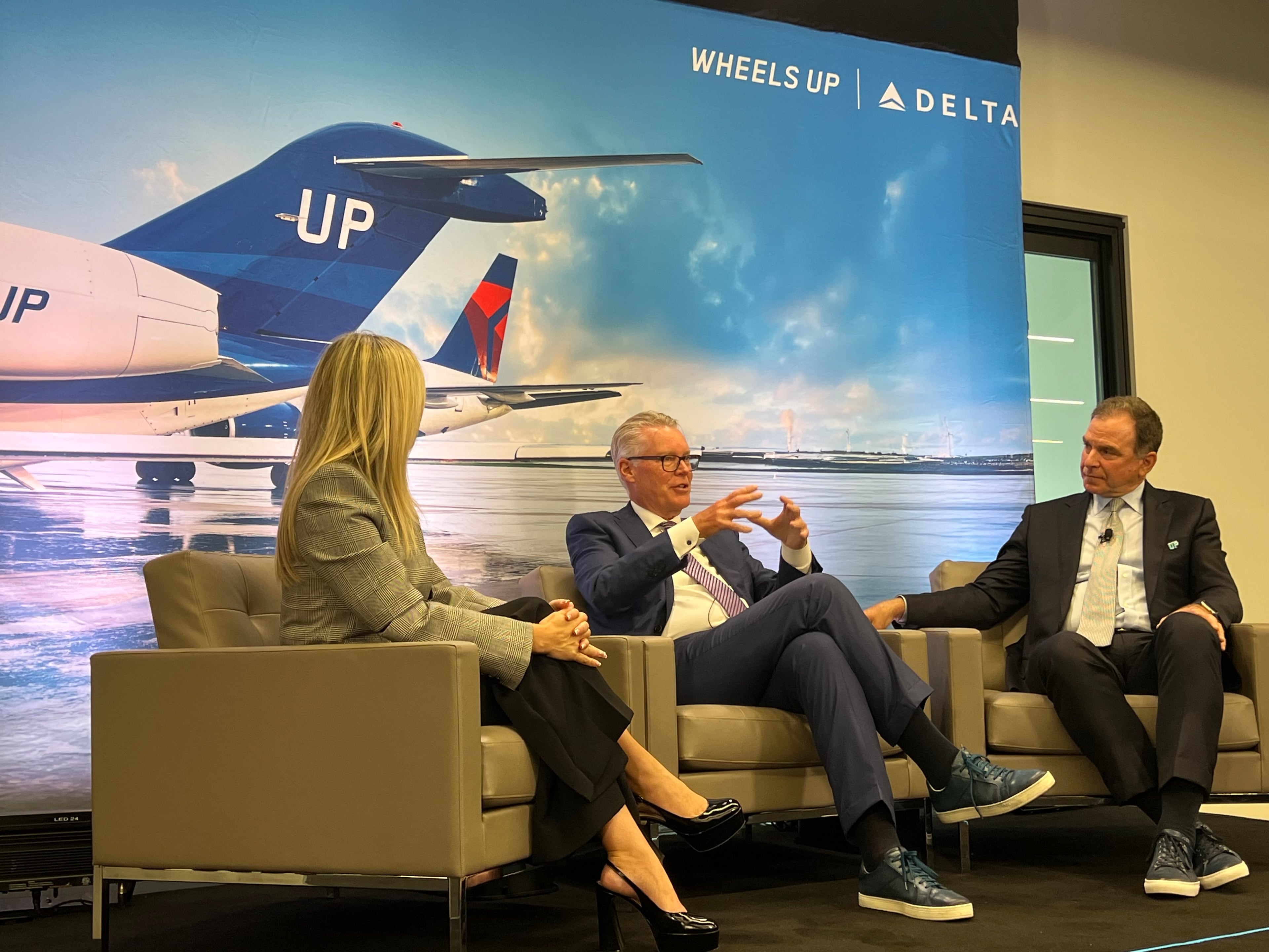 Wheels Up CEO George Mattson (right) — pictured at a 2024 town hall — said that since the private aviation company largely uses less congested, smaller airports, “in some ways, we’re a beneficiary of some of these challenges, but at the same time, they also affect us.” (Kelly Yamanouchi/AJC 2024)