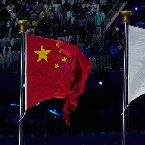 FILE - The flags of China and Japan are flown at the during the handover ceremony from China to Japan the next host of the Asian Games at the closing ceremony of the 19th Asian Games in Hangzhou, China, Sunday, Oct. 8, 2023. (AP Photo/Eugene Hoshiko, File)