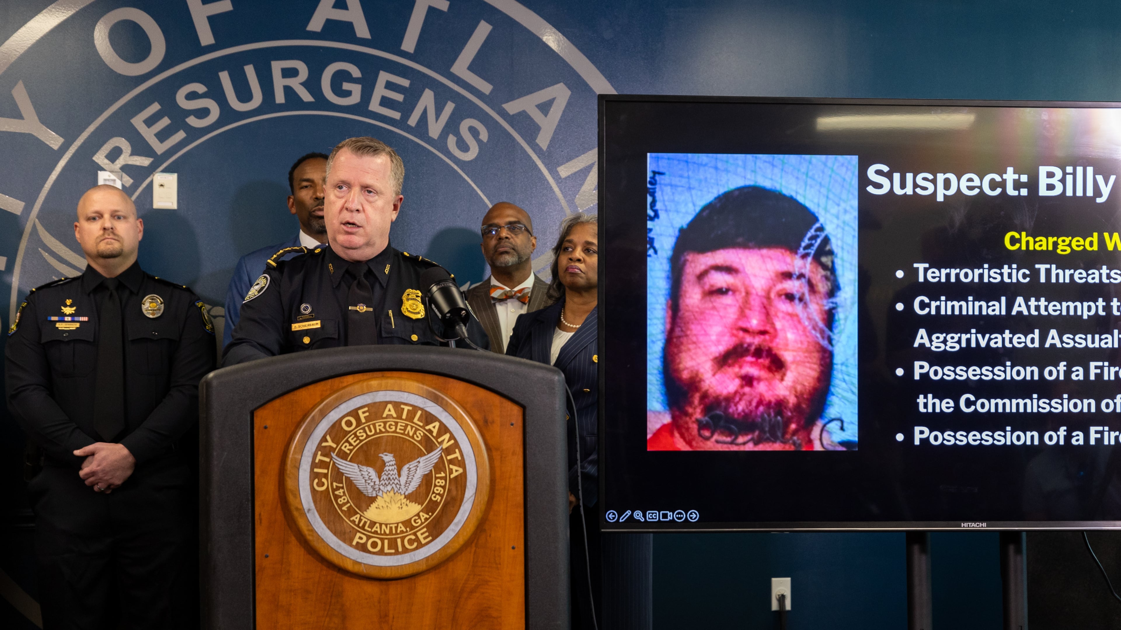 Atlanta Police Chief Darin Schierbaum speaks during a press conference at the Atlanta Police Department headquarters in Atlanta on Monday, October 20, 2025, regarding a Cartersville man, Billy Cagle, who threatened to "shoot up" the airport. (Arvin Temkar/Atlanta Journal-Constitution via AP)