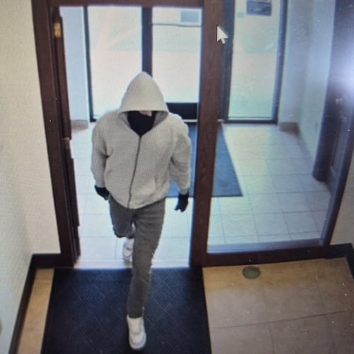 This image released by Kentucky State Police shows a suspect in a fatal bank robbery at a U.S. Bank in Berea, Ky., Thursday, April 30, 2026. (Kentucky State Police via AP)