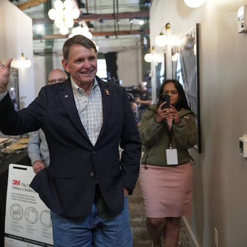 Republican congressional candidate Ed Gallrein greets supporters during an election night event Tuesday, May 19, 2026, in Covington, Ky. (AP Photo/Joshua A. Bickel)