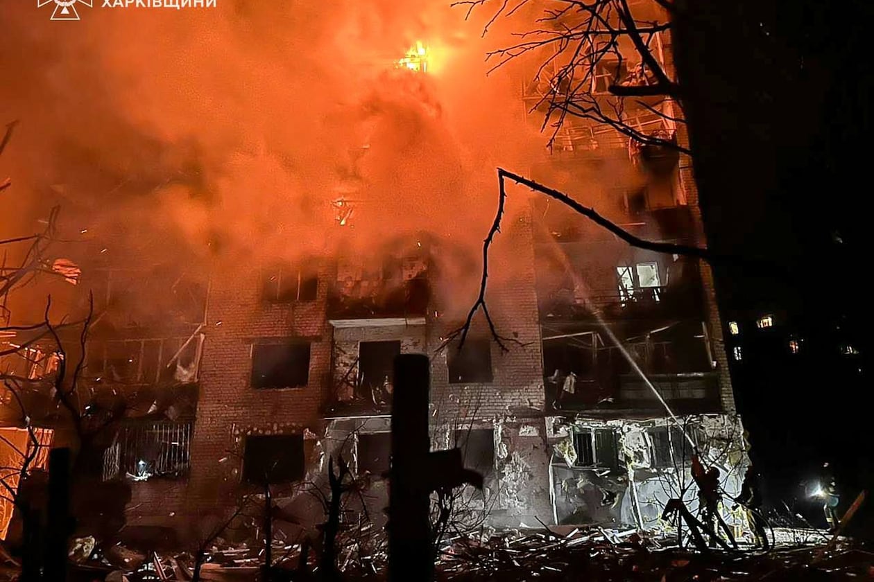 In this photo provided by the Ukrainian Emergency Service, emergency services personnel work to extinguish a fire following a Russian attack in Balakliya, Kharkiv region, Ukraine, Monday, Nov. 17, 2025. (Ukrainian Emergency Service via AP)