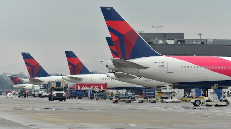 Delta planes at domestic gates at Hartsfield-Jackson International Airport on Wednesday, February 27, 2019. HYOSUB SHIN / HSHIN@AJC.COM